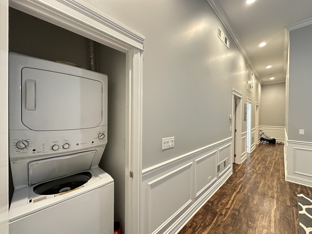 3336 West Irving Park Road, Unit 1 Chicago, IL 60618 - Photo 20 of 20 a view of a hallway with washer and dryer