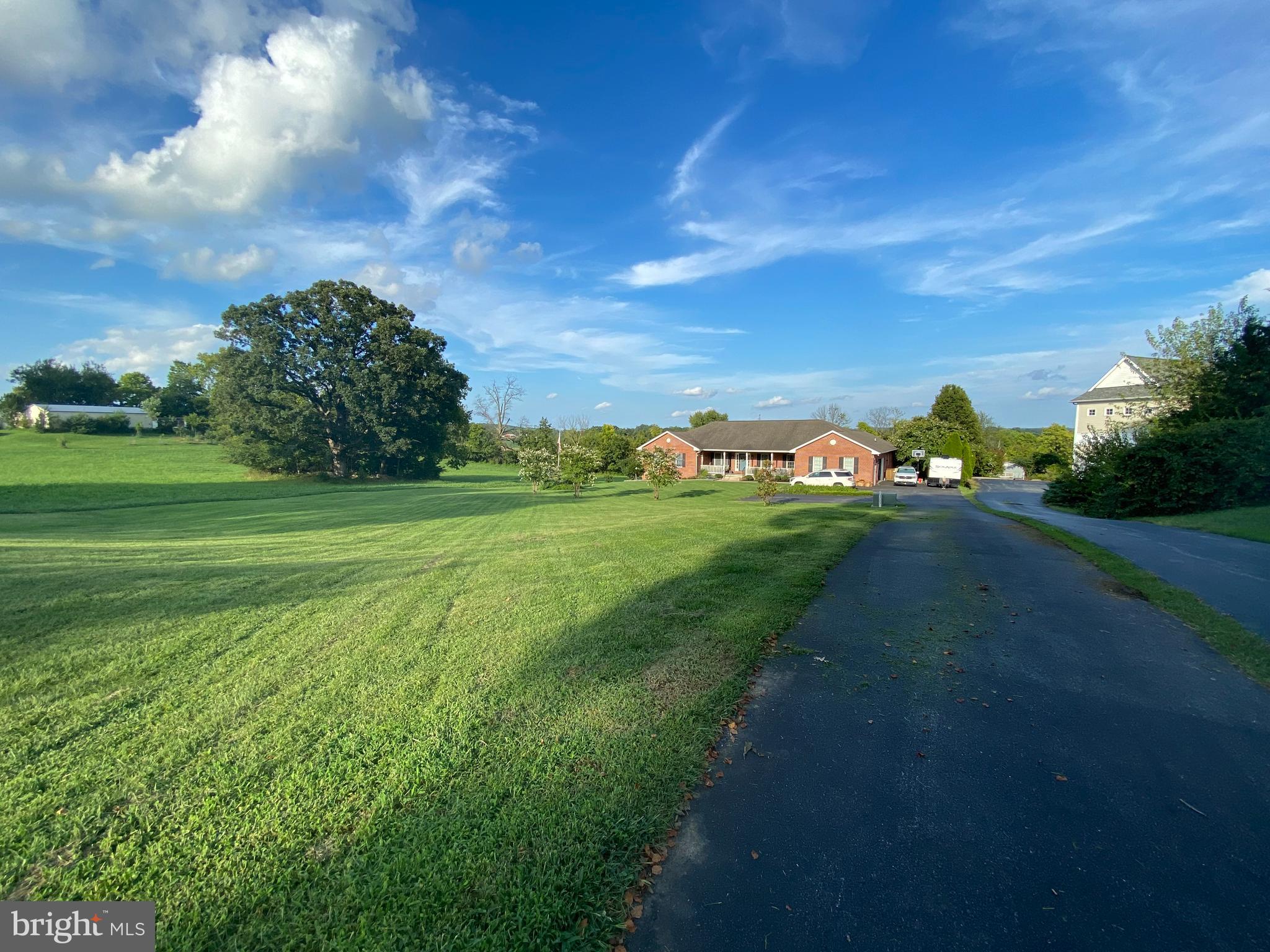 3723 Big Woods Road Ijamsville, MD 21754 - Photo 27 of 36 a view of a golf course with a garden