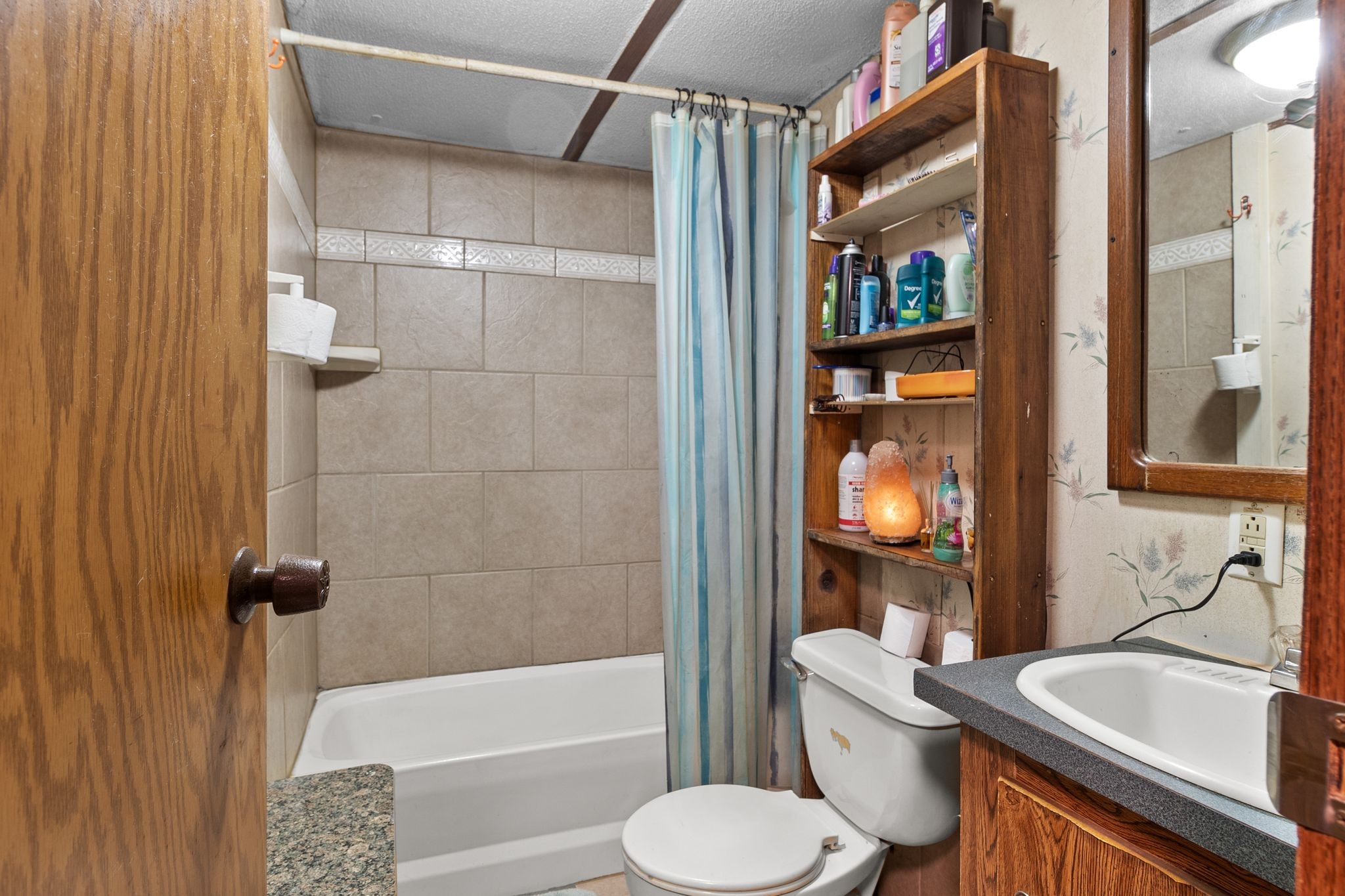 2417 Esque Sharp Road Mount Pleasant, TN 38474 - Photo 13 of 21 a bathroom with a sink toilet and shower