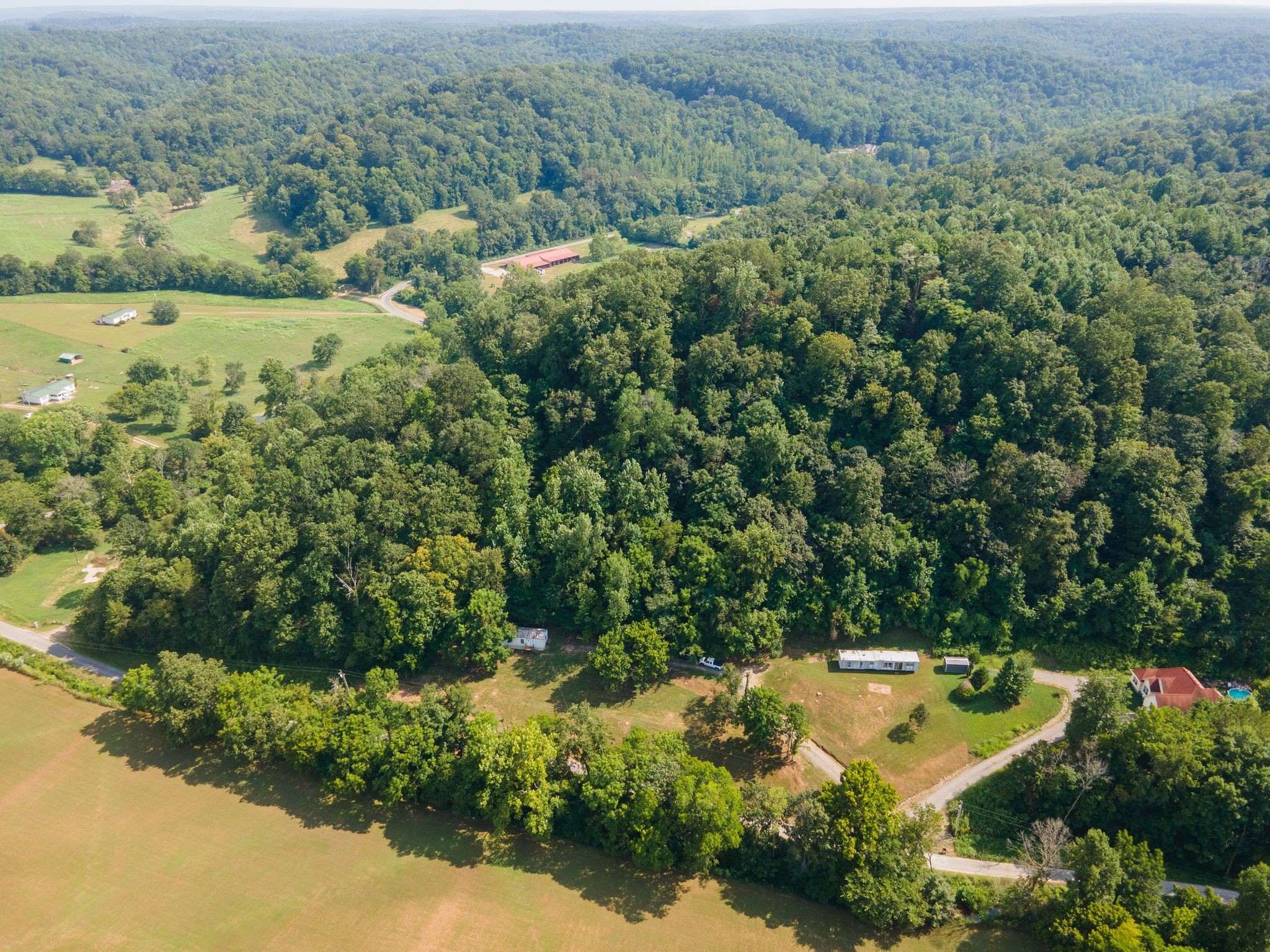 2417 Esque Sharp Road Mount Pleasant, TN 38474 - Photo 16 of 21 an aerial view of a houses with yard