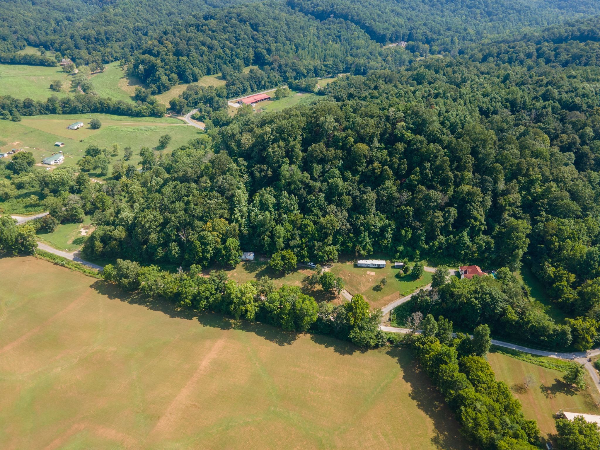 2417 Esque Sharp Road Mount Pleasant, TN 38474 - Photo 17 of 21 an aerial view of a houses with a yard and lake view
