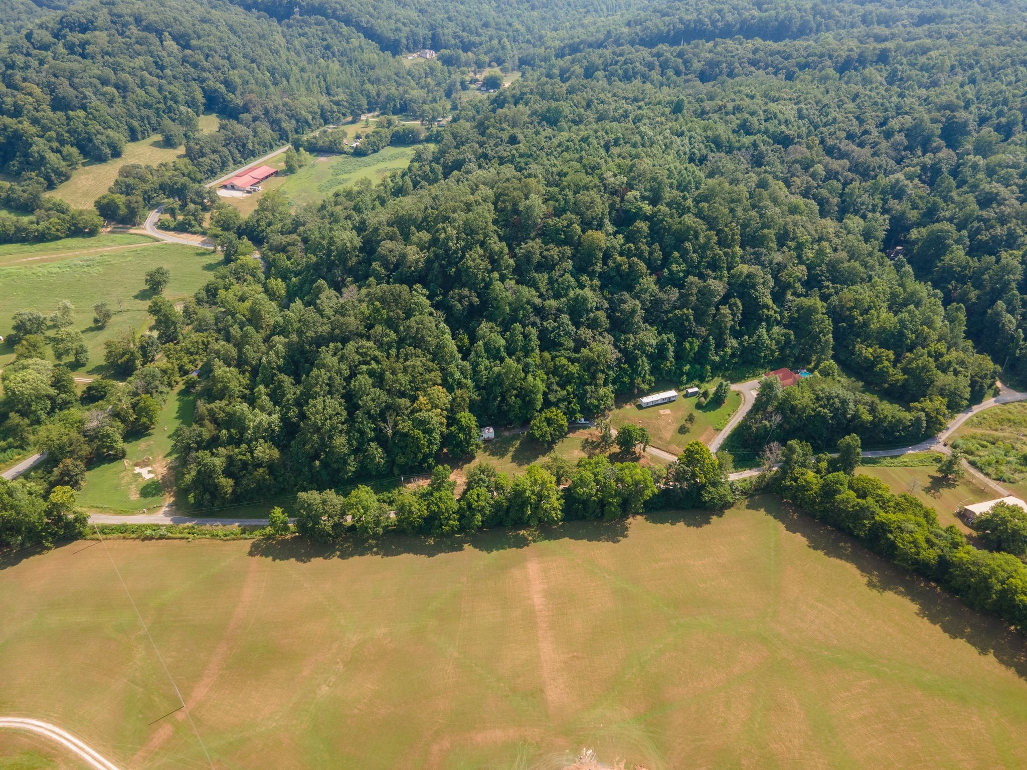 2417 Esque Sharp Road Mount Pleasant, TN 38474 - Photo 18 of 21 an aerial view of a house with a yard and lake view