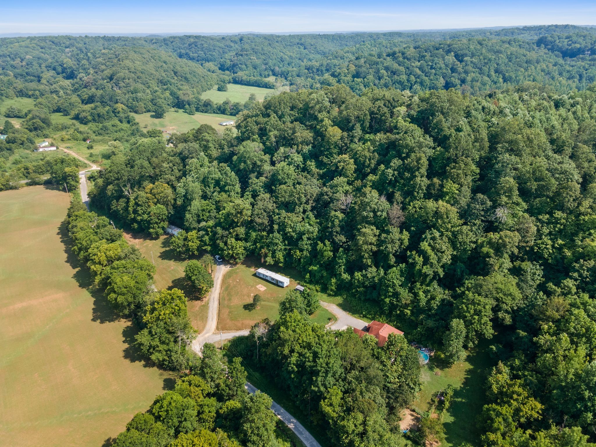 2417 Esque Sharp Road Mount Pleasant, TN 38474 - Photo 19 of 21 an aerial view of a house with a yard