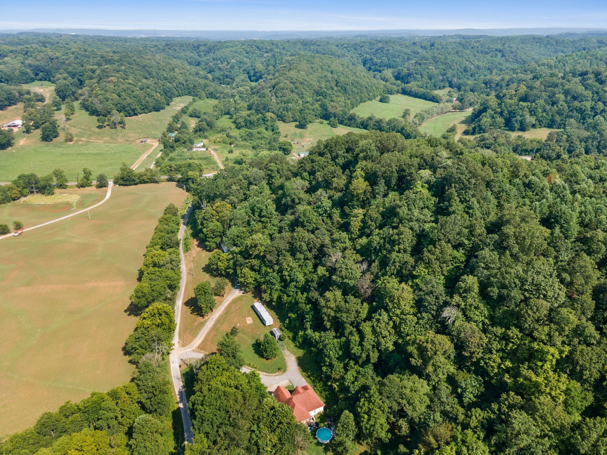 2417 Esque Sharp Road Mount Pleasant, TN 38474 - Photo 20 of 21 an aerial view of a house with a yard