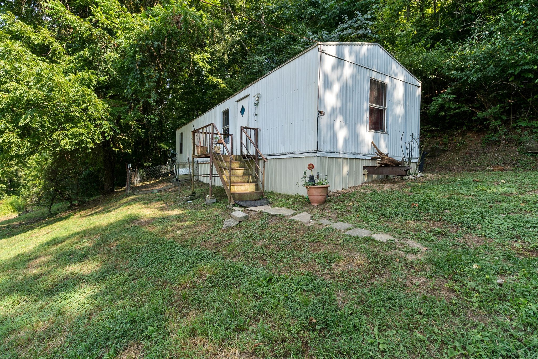 2417 Esque Sharp Road Mount Pleasant, TN 38474 - Photo 3 of 21 a view of backyard with large trees