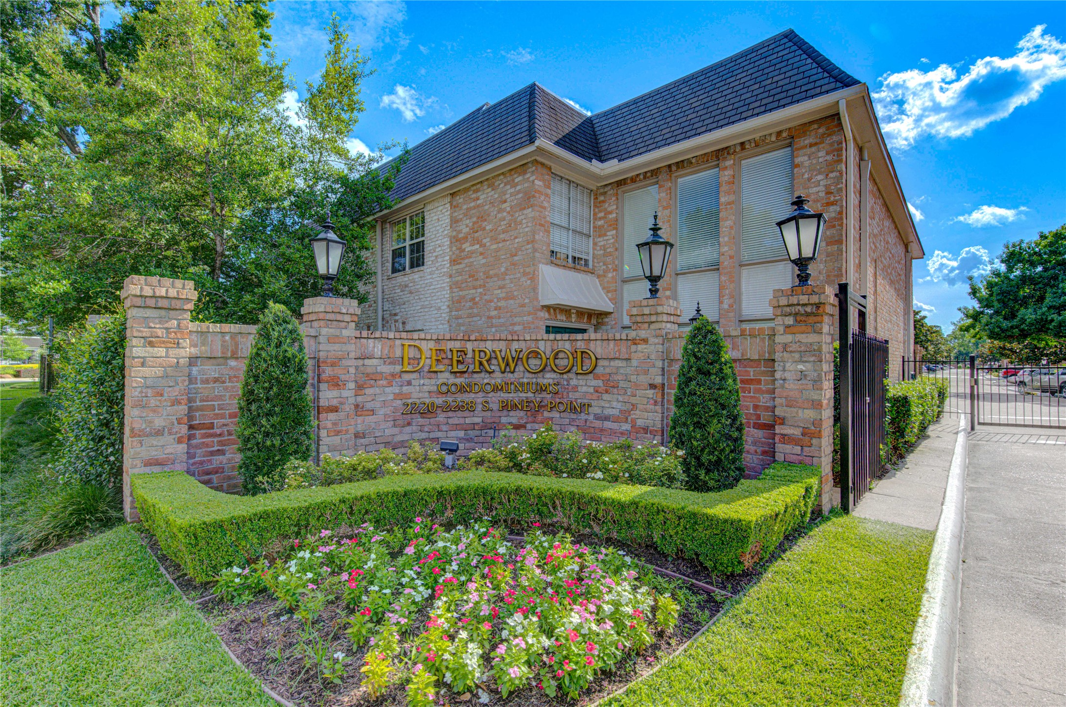 Welcome to Deerwood Condominiums — a beautifully maintained gated community offering lush landscaping, privacy, and an unbeatable Memorial-area location.
