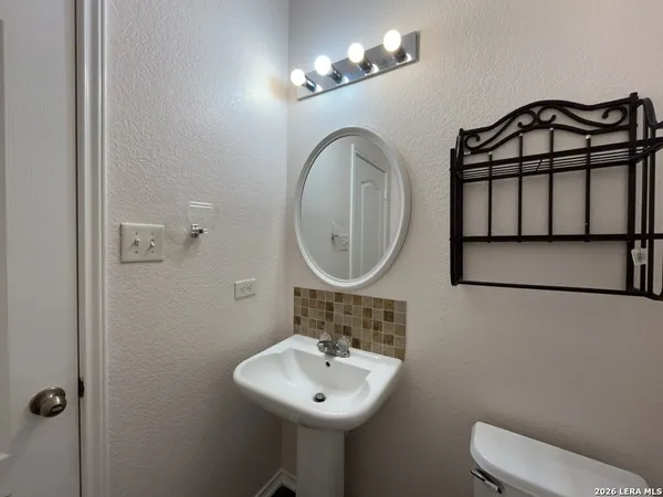 a view of swimming pool with a yard