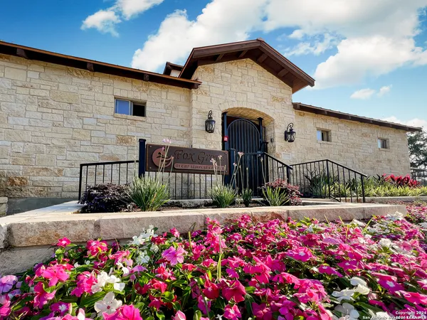 a picture of a room with a bench and a wooden floor