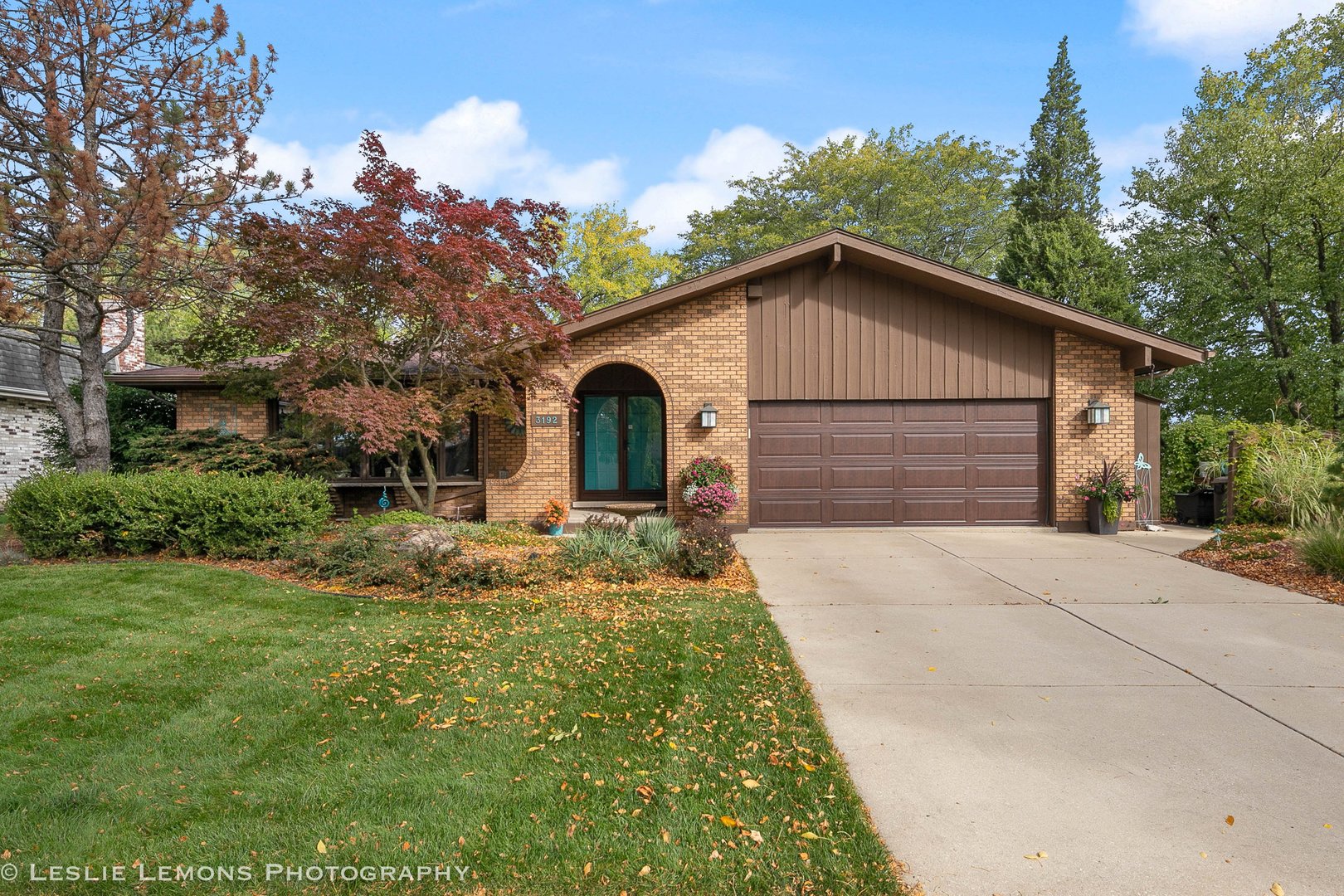 3192 Beller Drive Darien, IL 60561 - Photo 1 of 50 a front view of a house with a yard and garage