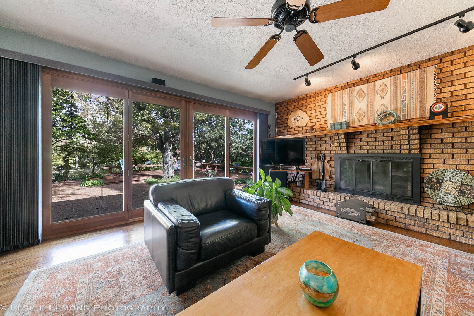 3192 Beller Drive Darien, IL 60561 - Photo 15 of 50 a living room with fireplace furniture and a floor to ceiling window