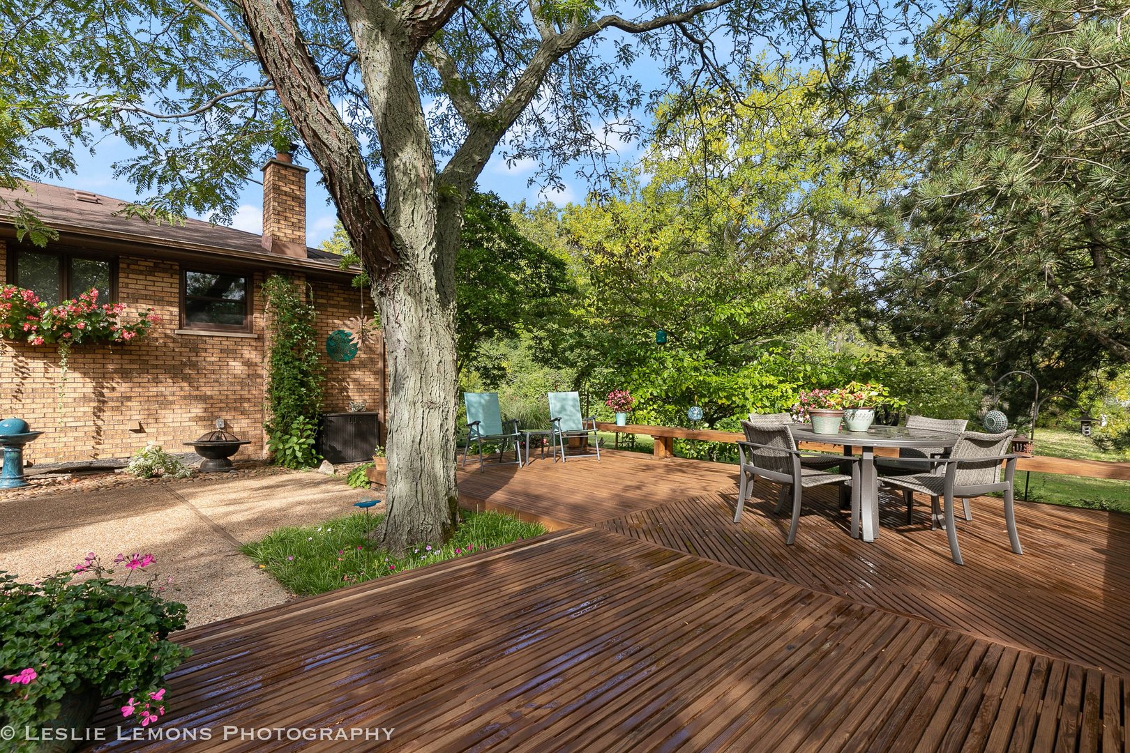3192 Beller Drive Darien, IL 60561 - Photo 34 of 50 a view of a patio with table and chairs and potted plants