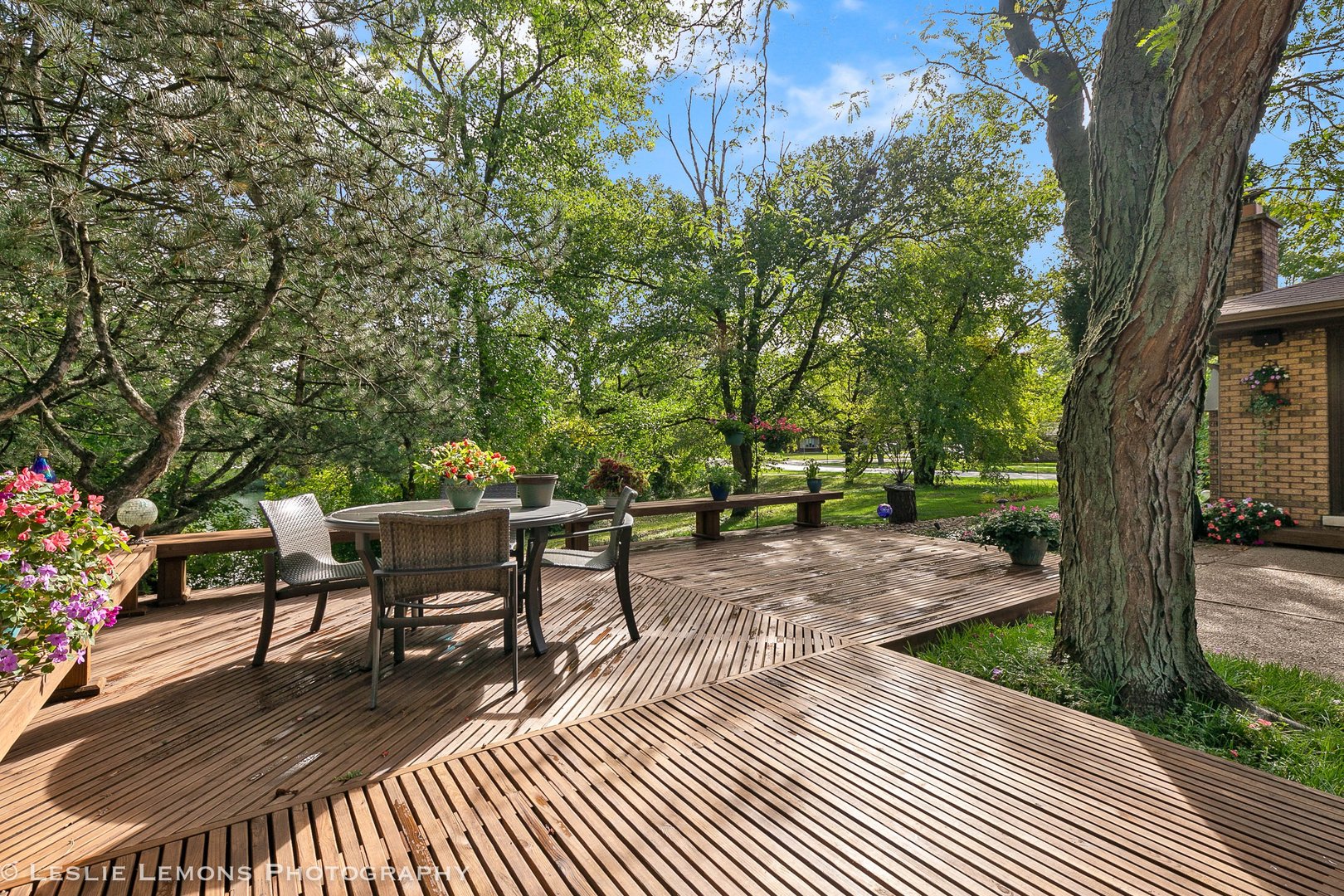 3192 Beller Drive Darien, IL 60561 - Photo 39 of 50 a view of a patio with table and chairs and potted plants with large tree