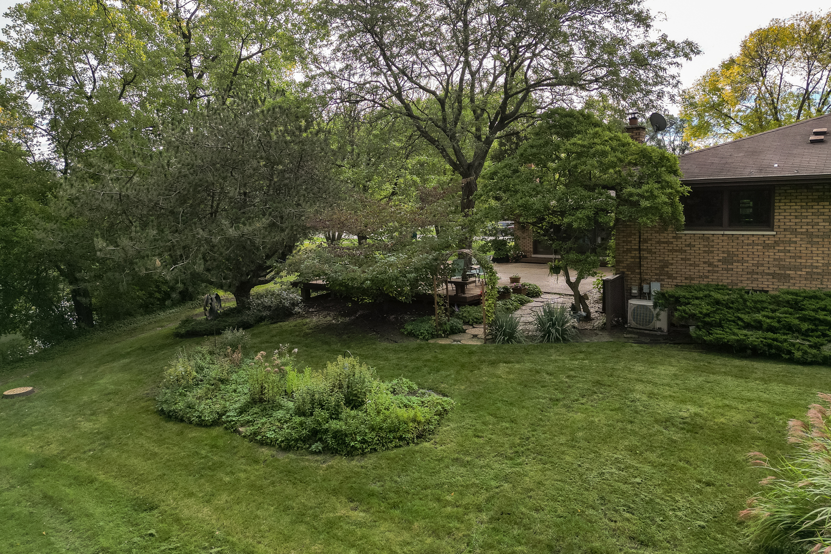 3192 Beller Drive Darien, IL 60561 - Photo 42 of 50 a backyard of a house with yard and trampoline