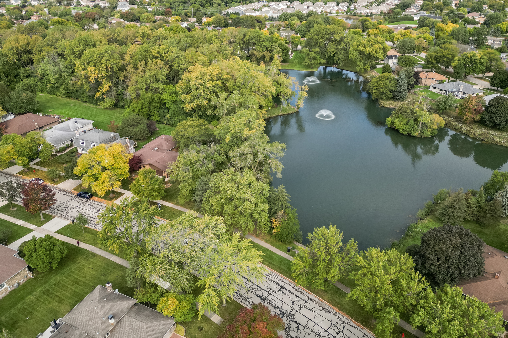 3192 Beller Drive Darien, IL 60561 - Photo 45 of 50 an aerial view of a house with a yard and lake view