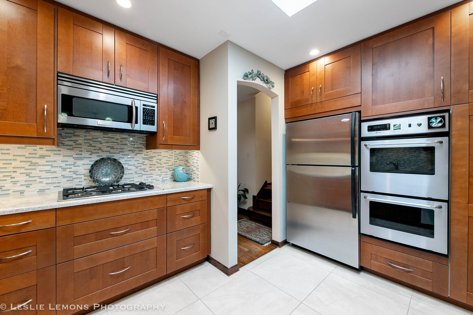 3192 Beller Drive Darien, IL 60561 - Photo 6 of 50 a kitchen with granite countertop stainless steel appliances and wooden cabinets