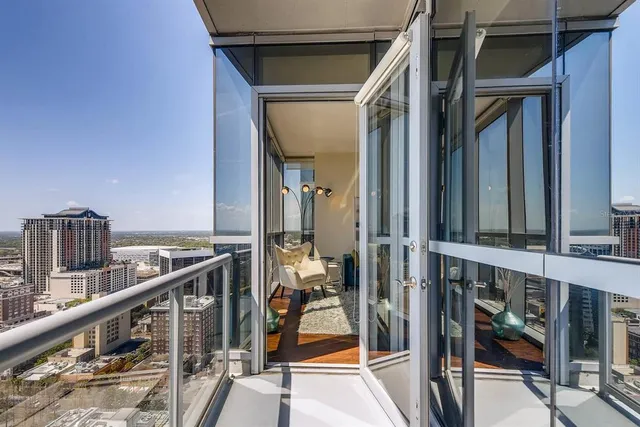 a view of balcony with furniture