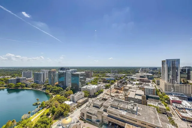 a view of a lake with a city