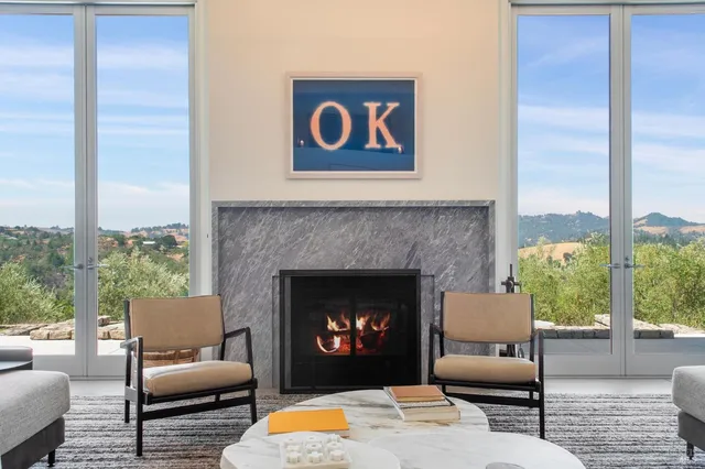 a garden with trees in the background