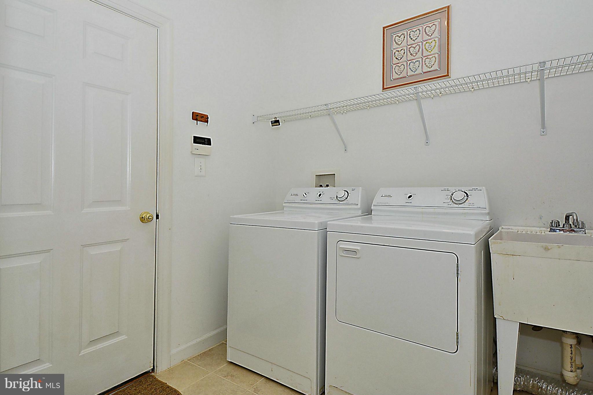 383 Colony Point Place Edgewater, MD 21037 - Photo 21 of 30 Laundry Room Leads to Garage