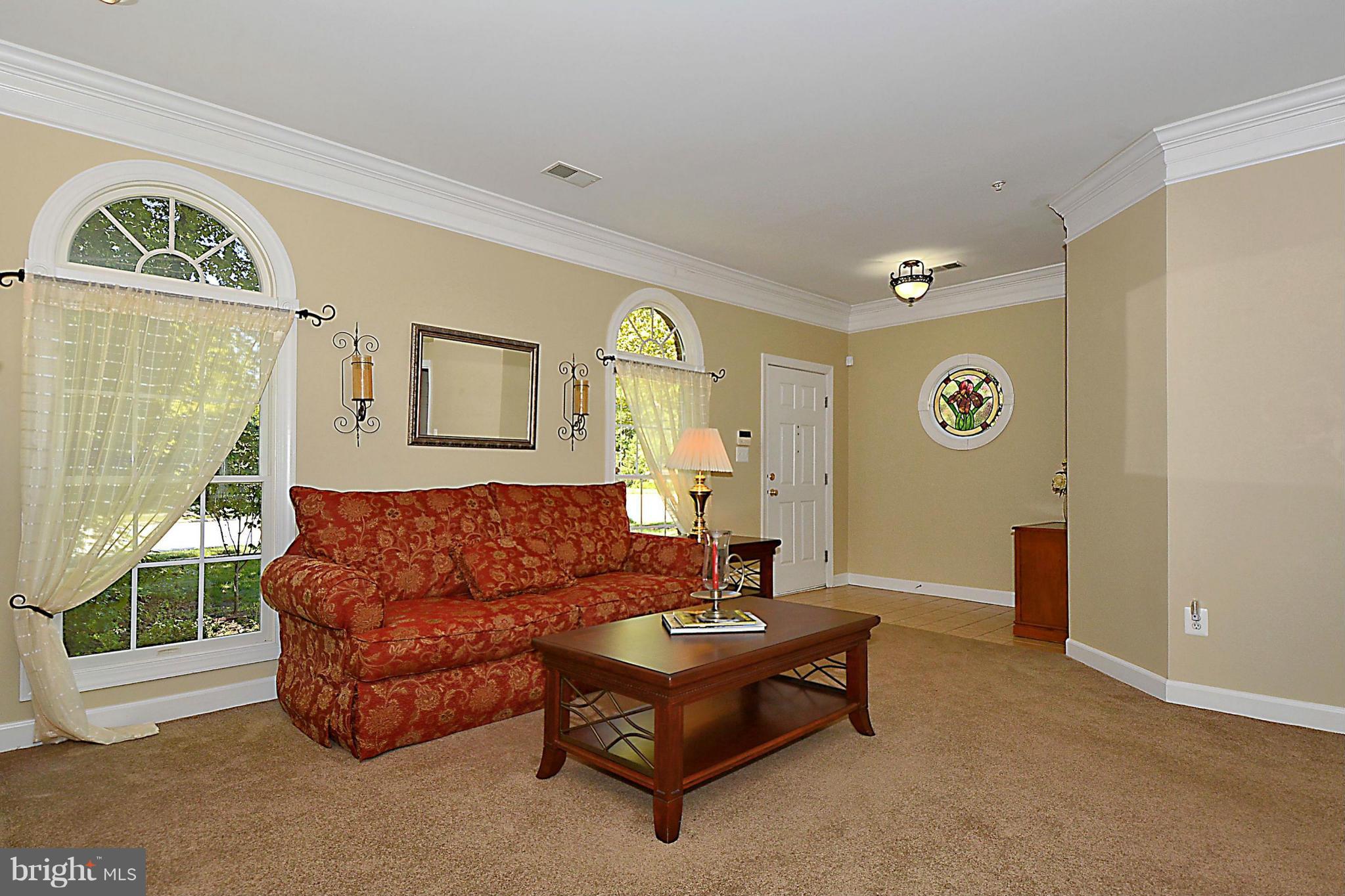 383 Colony Point Place Edgewater, MD 21037 - Photo 5 of 30 Living Room w/Beautiful Crown Molding and Windows