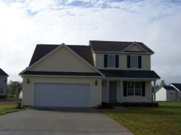a front view of house with yard