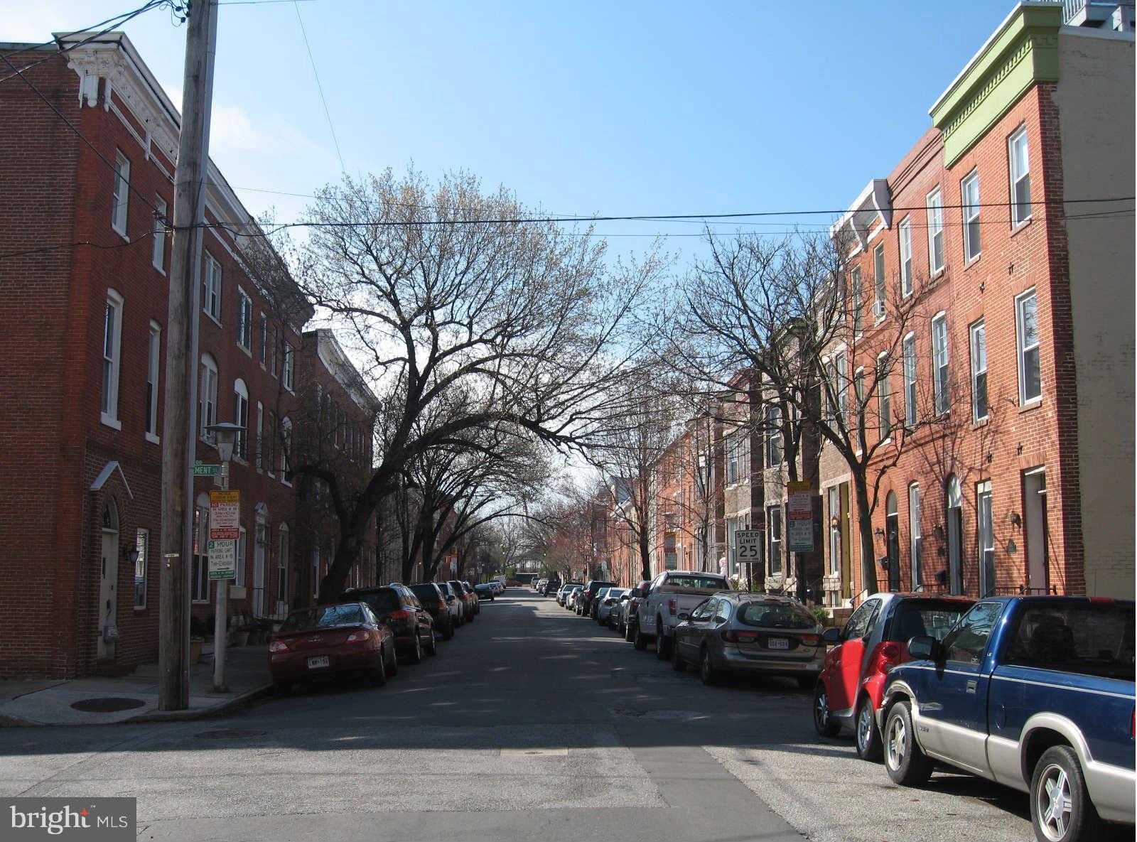1415 Riverside Avenue Baltimore, MD 21230 - Photo 2 of 24 a view of car parked on the side of a street
