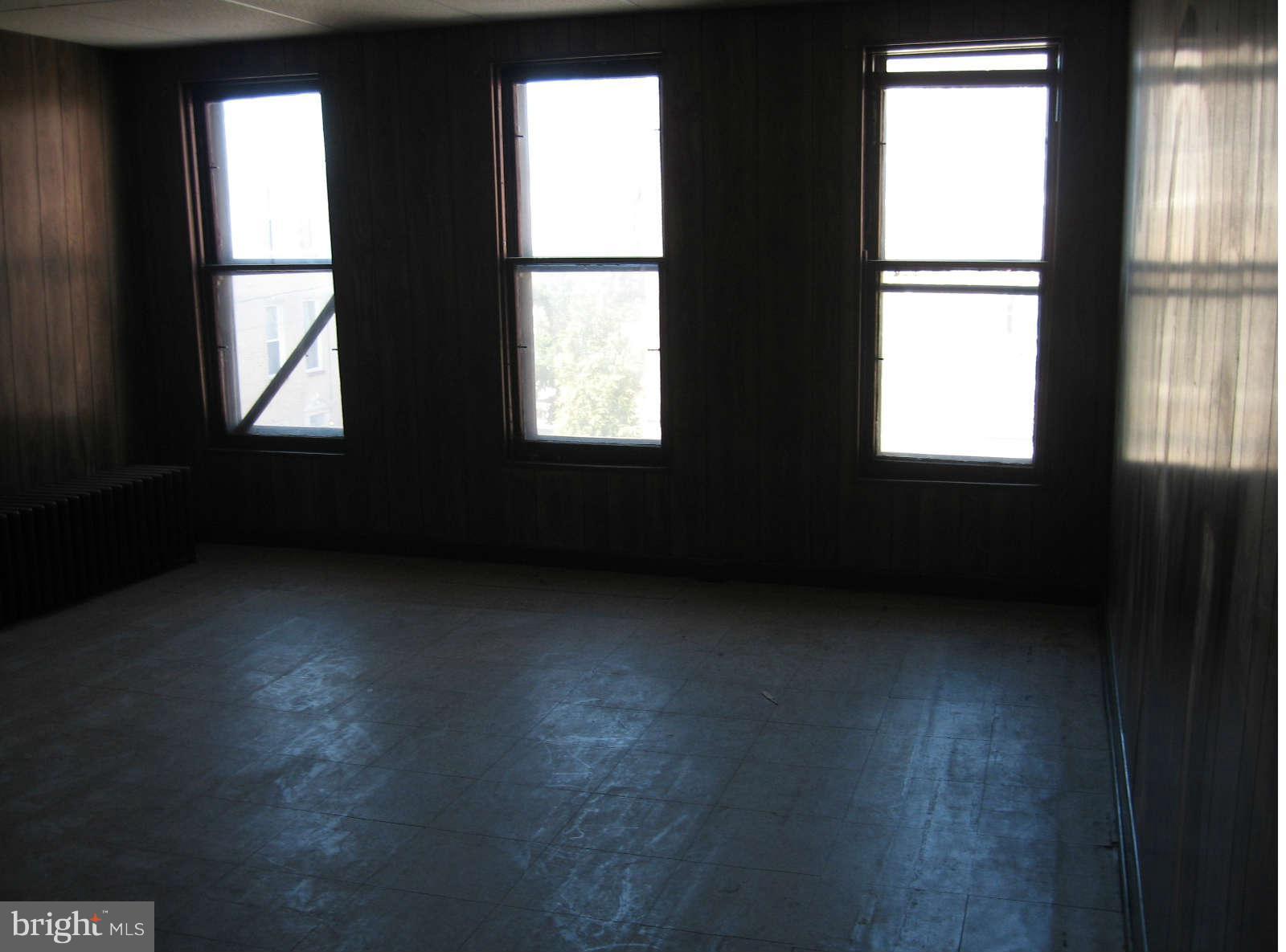1415 Riverside Avenue Baltimore, MD 21230 - Photo 16 of 24 a view of an empty room with a window