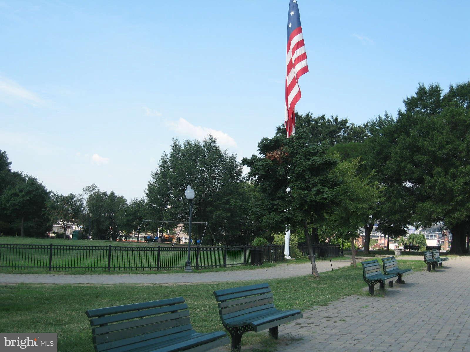1415 Riverside Avenue Baltimore, MD 21230 - Photo 20 of 24 a view of a park with bench and trees