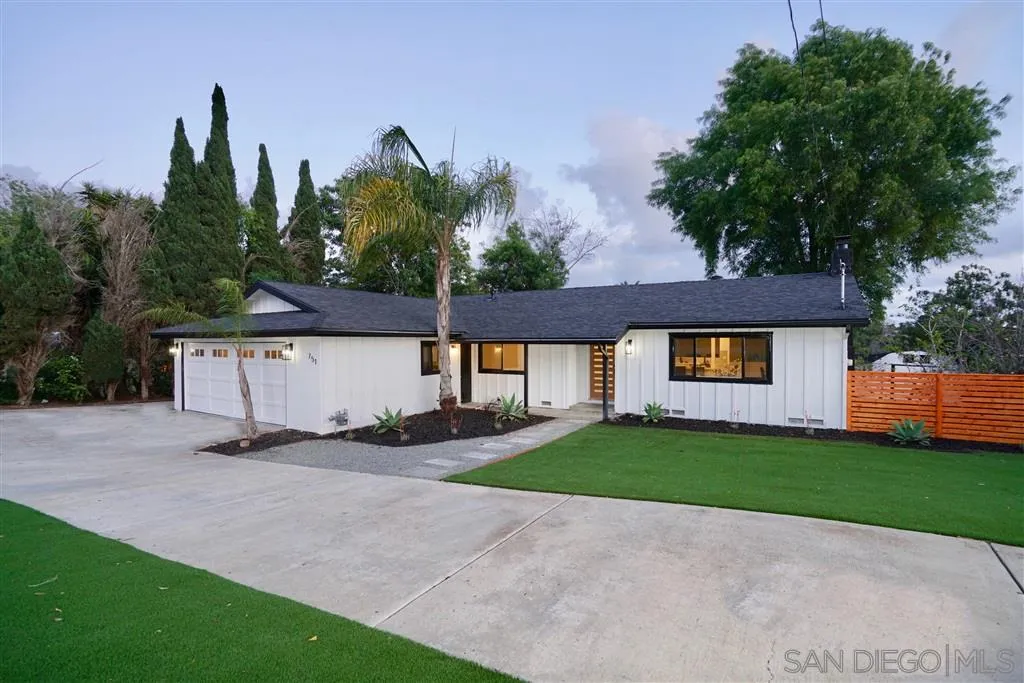 751 Crestview Road Vista, CA 92081 - Photo 6 of 24 a front view of a house with a yard and garage