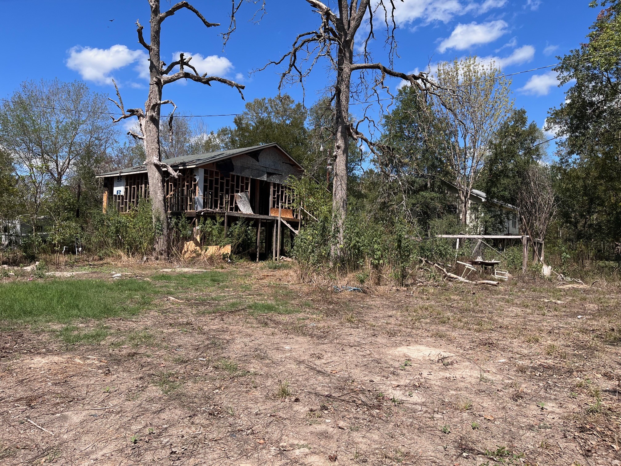 166 Plantation Road Trinity, TX 75862 - Photo 6 of 6 a view of a house with a yard