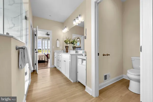 a view of a balcony with furniture and a fire pit