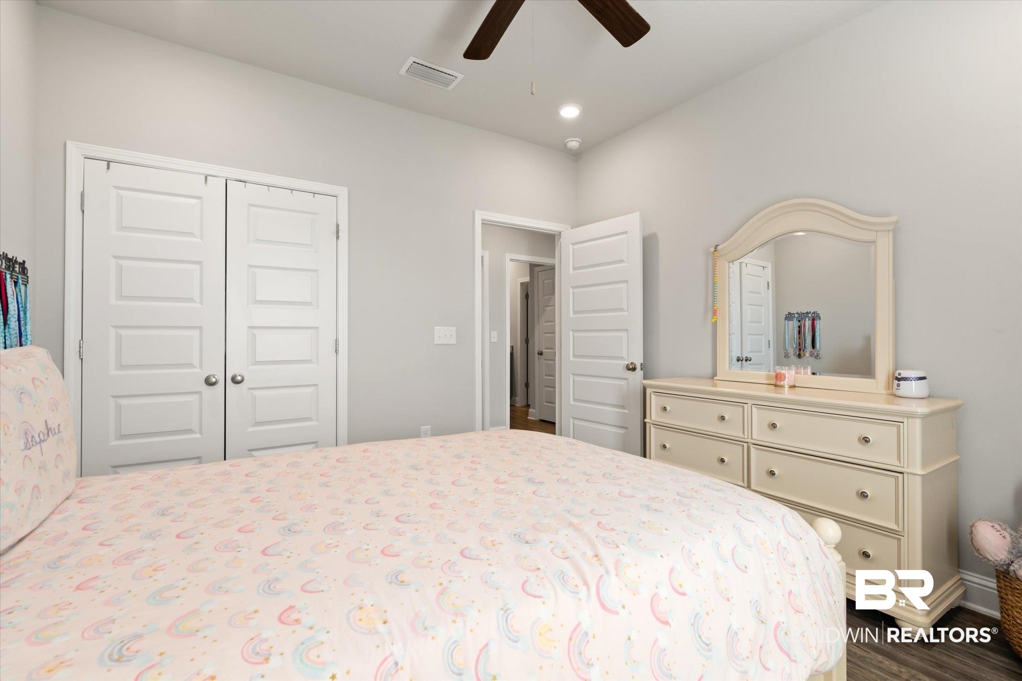 12899 Sanderling Loop Daphne, AL 36527 - Photo 20 of 28 Bedroom with a closet, ceiling fan, and dark hardwood / wood-style flooring