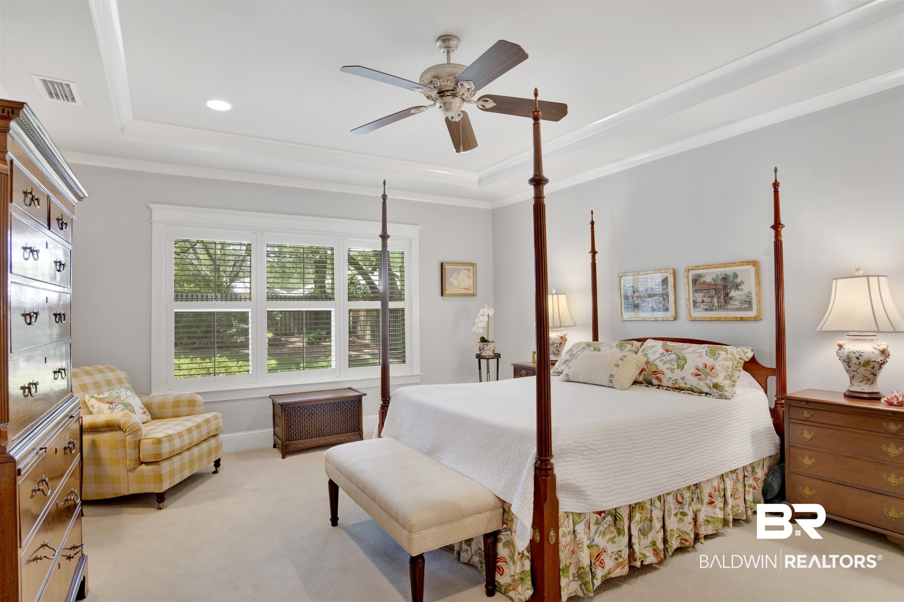 131 Sedgefield Avenue Fairhope, AL 36532 - Photo 23 of 50 Bedroom featuring a raised ceiling, light colored carpet, ornamental molding, and ceiling fan