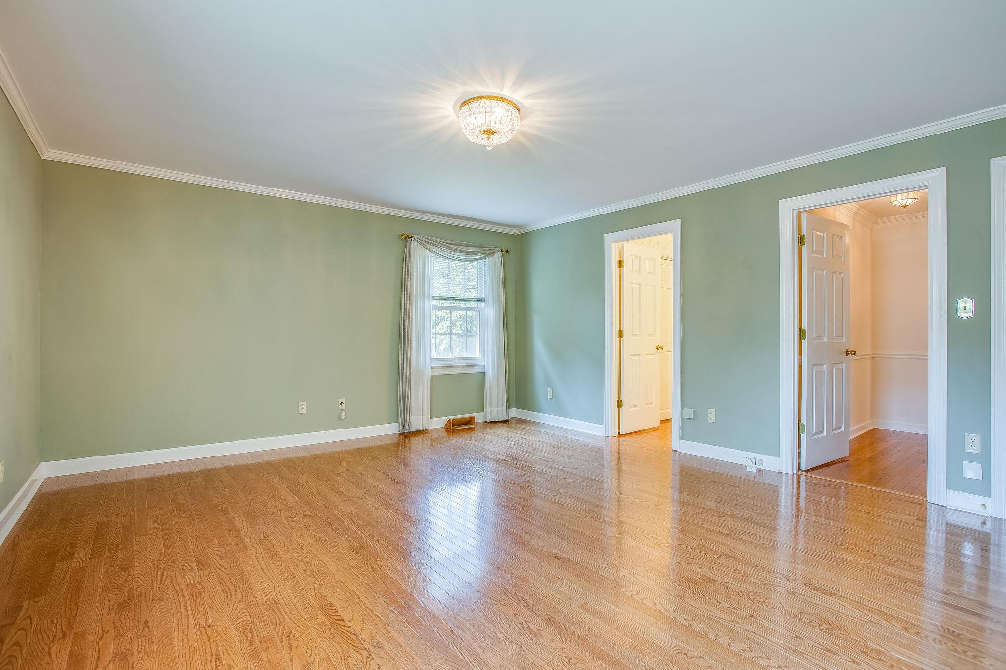 4047 Arno Road Franklin, TN 37064 - Photo 13 of 30 wooden floor in an empty room with a window