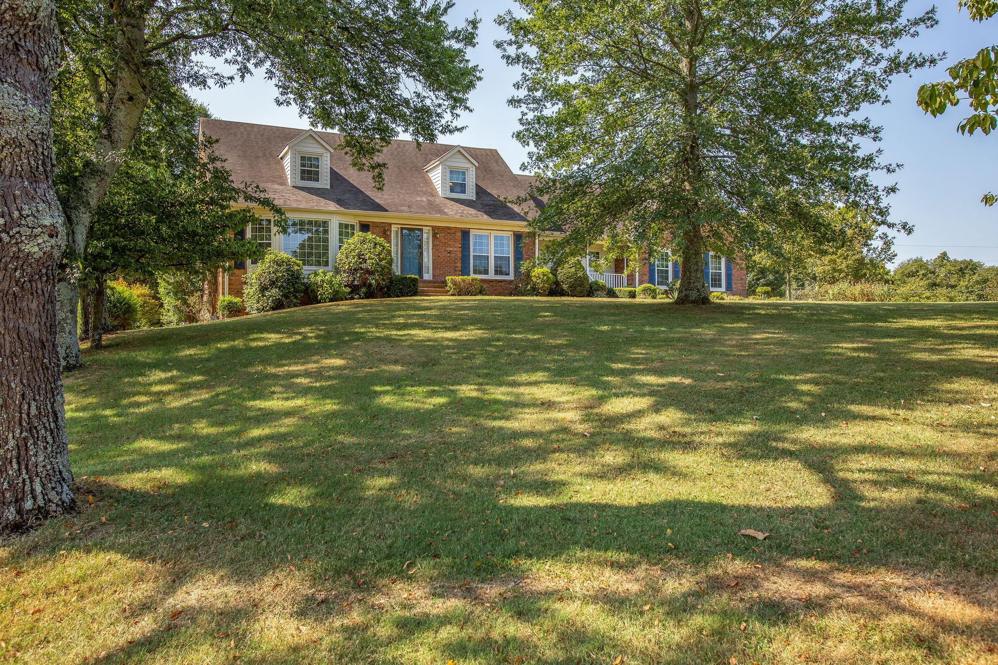 4047 Arno Road Franklin, TN 37064 - Photo 3 of 30 a front view of a house with a yard