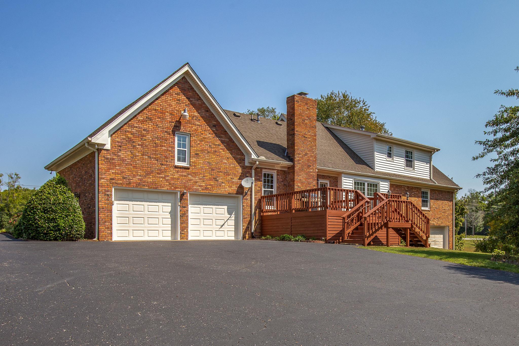 4047 Arno Road Franklin, TN 37064 - Photo 25 of 30 a view of a house with a yard