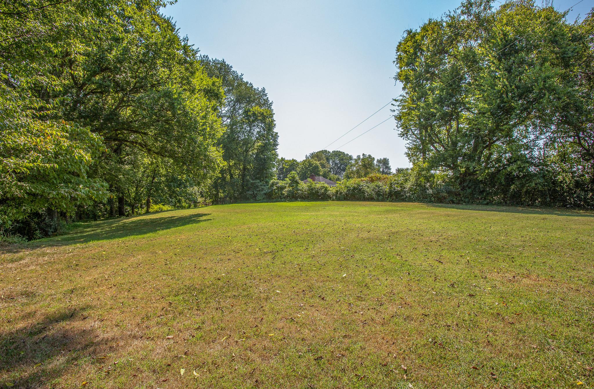 4047 Arno Road Franklin, TN 37064 - Photo 28 of 30 a view of a yard with a trees