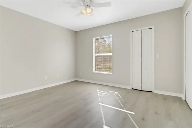 an empty room with windows