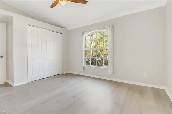 an empty room with windows