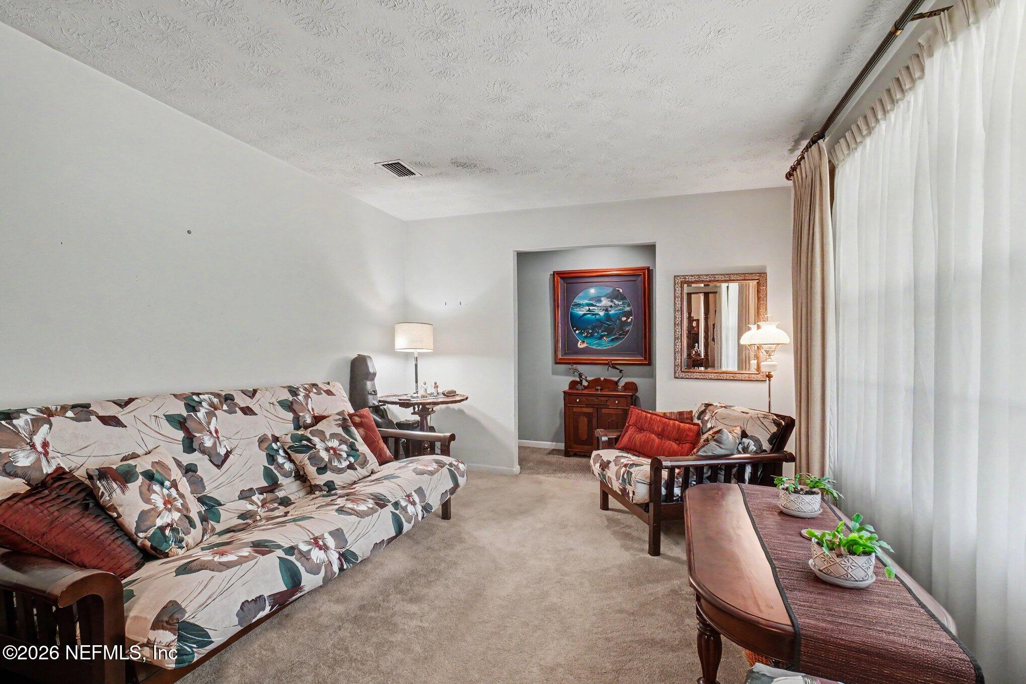 3934 Spring Glen Road Jacksonville, FL 32207 - Photo 5 of 29 005_file_3575