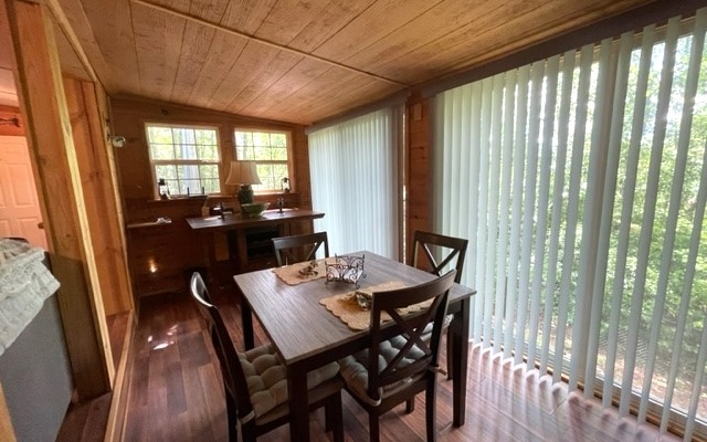 30 Sapphire Ridge Murphy, NC 28906 - Photo 4 of 26 a dining room with furniture a chandelier and wooden floor