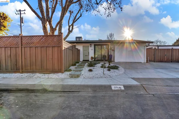 a view of a backyard of the house