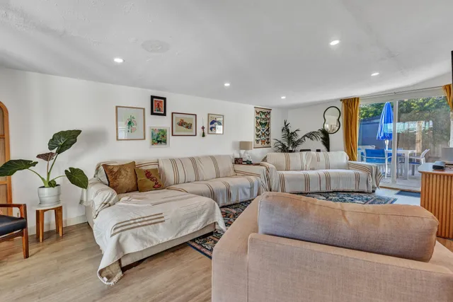 a bedroom with a bed and a view of bathroom