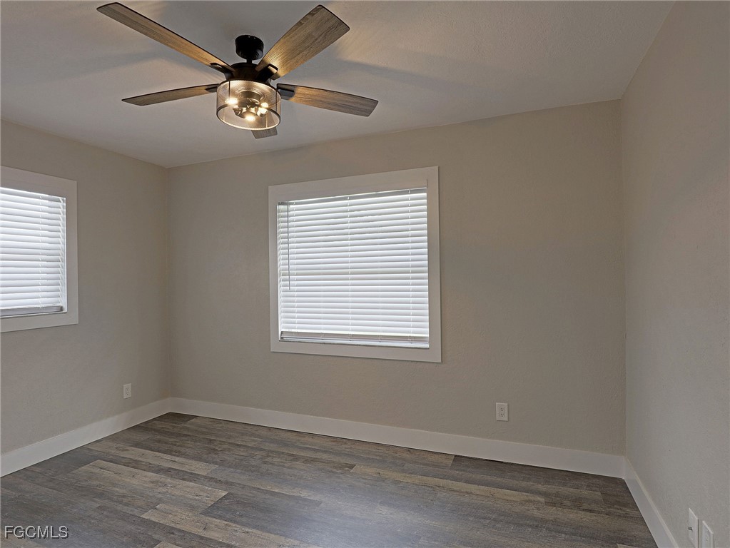 14181 Old Olga Road Fort Myers, FL 33905 - Photo 6 of 13 a view of an empty room with a window