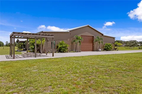 a view of a workspace with furniture