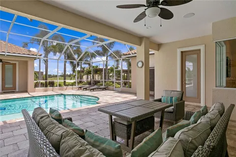 a room with furniture and a large window