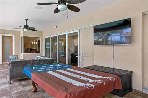 a room with furniture and view of living room