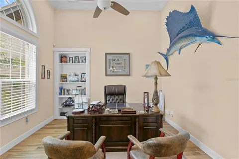 a kitchen with a refrigerator and a sink