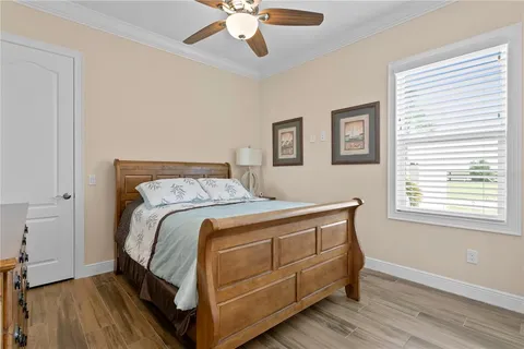 a view of a kitchen with refrigerator and cabinets