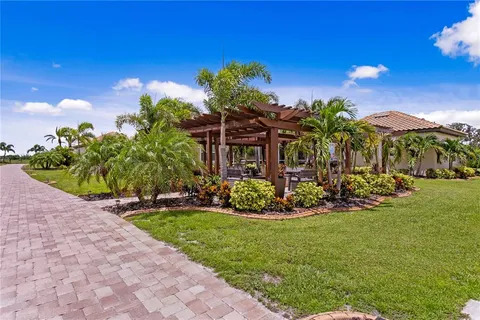 a view of a golf course with a lake view